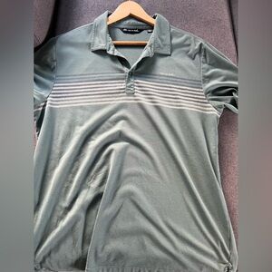 Travis Mathew green with light green and blue stripes golf polo